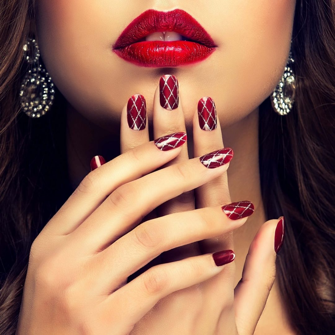 elegant-female-hands-with-professionally-made-manicure-nails-beautiful-slender-graceful-fingers-front-well-shaped-lips-colored-cherry-lipstick-manicure-jewelry-cosmetic